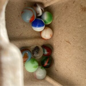 Vintage collectible banana . Vibrant Swirl Glass Marbles Collection